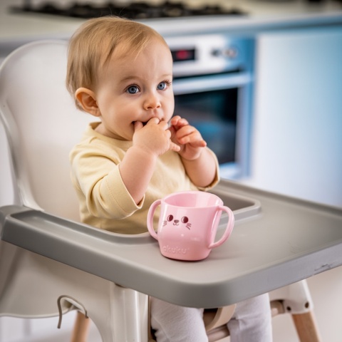 Kubek do nauki picia z uchwytami krzywy pochyły otwarty Akuku 150 ml różowy