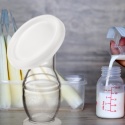 Laktator ręczny Akuku kolektor na mleko Magiczna Butelka Silikonowy 100 ml